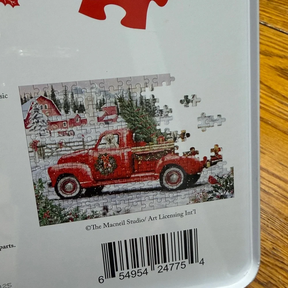 Christmas Scene 300 piece puzzle in a collector tin.  Originally a cookie tin.